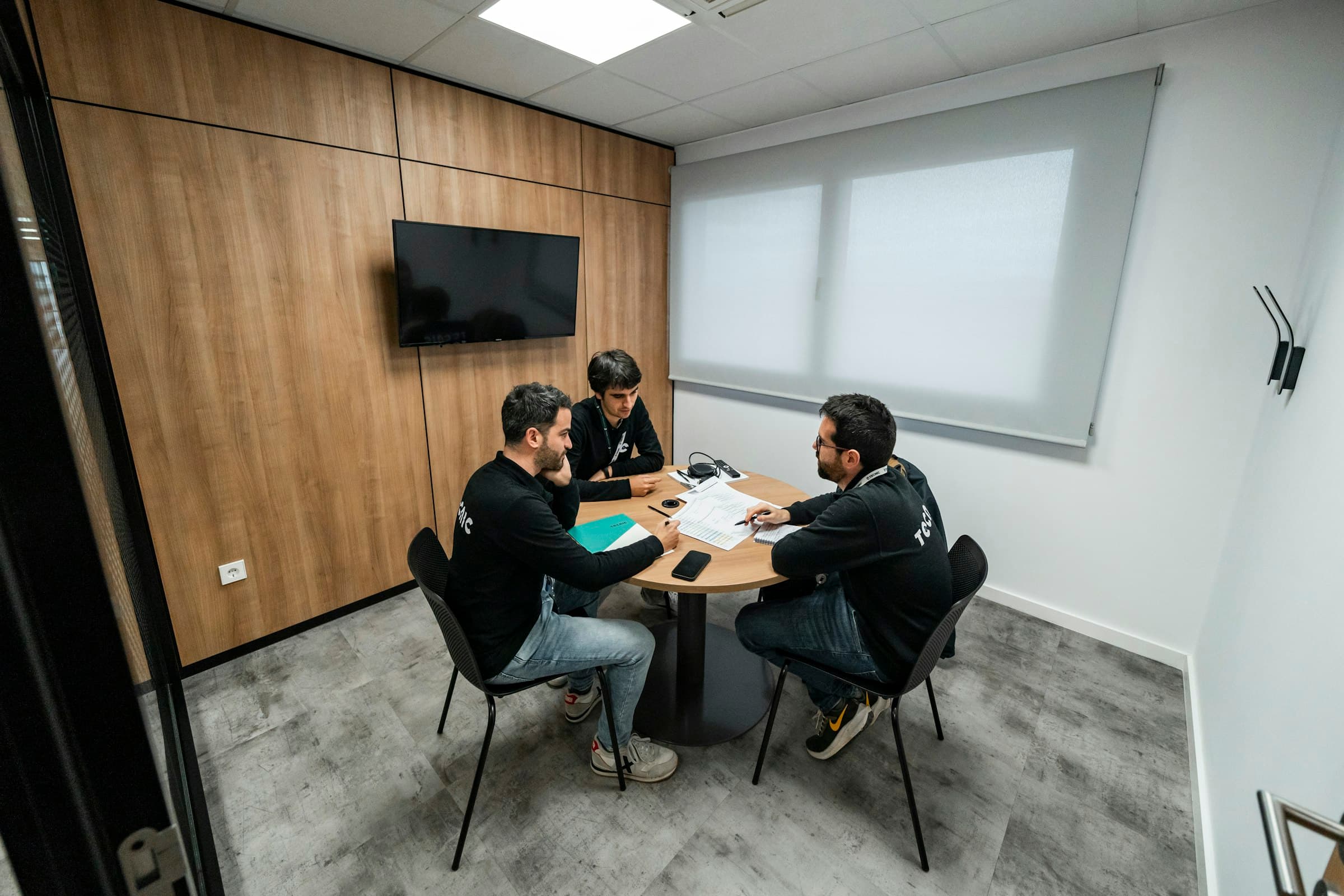 Operations team reviewing claims data in a meeting room